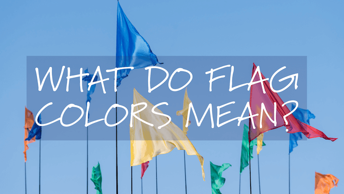 Flags of various colors with "what do flag colors mean" on it
