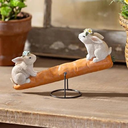 Bunnies on Carrot Seesaw - The Flag Lady